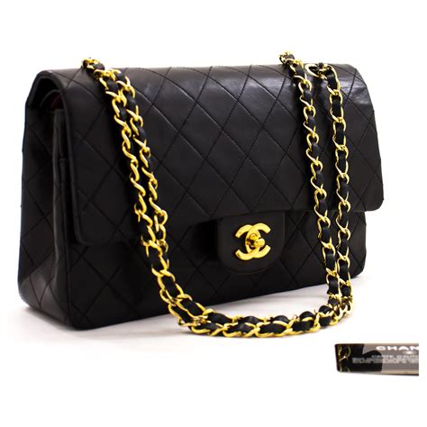 black chanel purse with chain strap|Black Chanel shoulder bag.